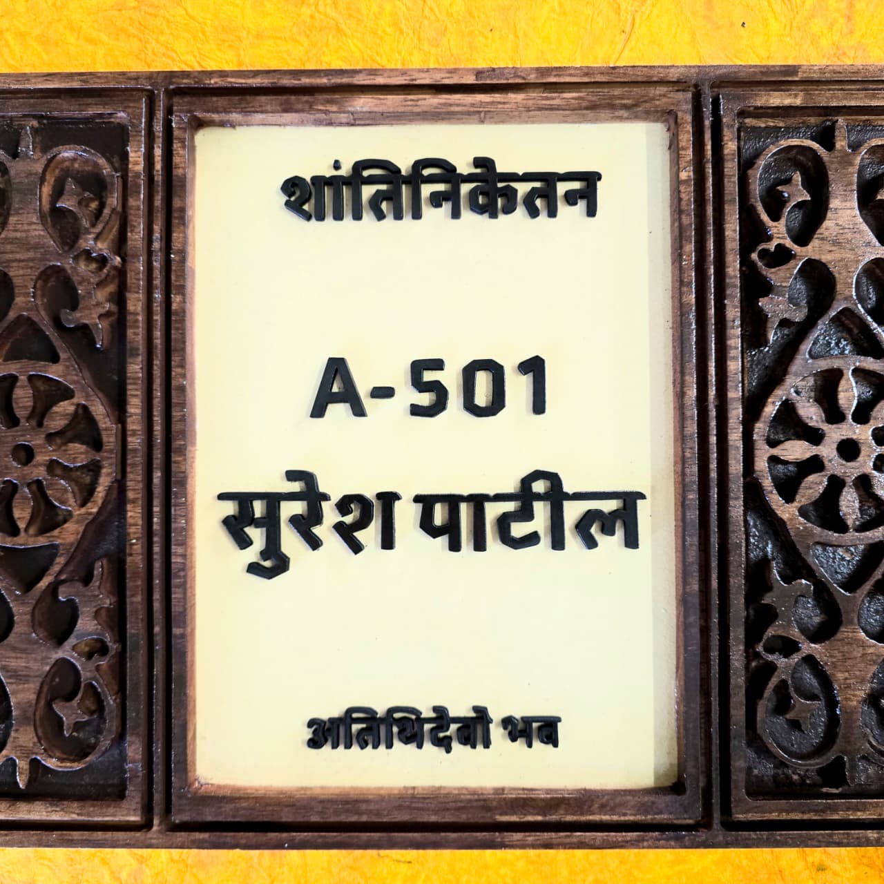 Traditional Wooden Nameplate with Intricate Carvings